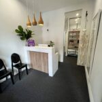 Comfortable waiting area at Human Movement Co. in Leichhardt, offering a welcoming and professional environment for patients.